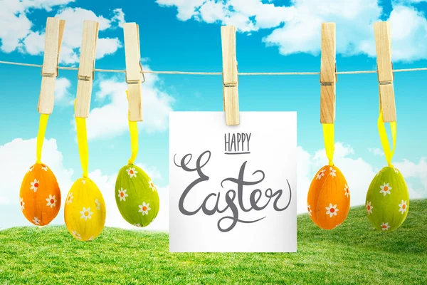 Easter graphic against field and sky — Stock Photo, Image