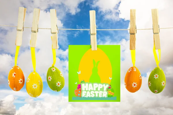 Happy easter afbeelding tegen blauwe hemel — Stockfoto