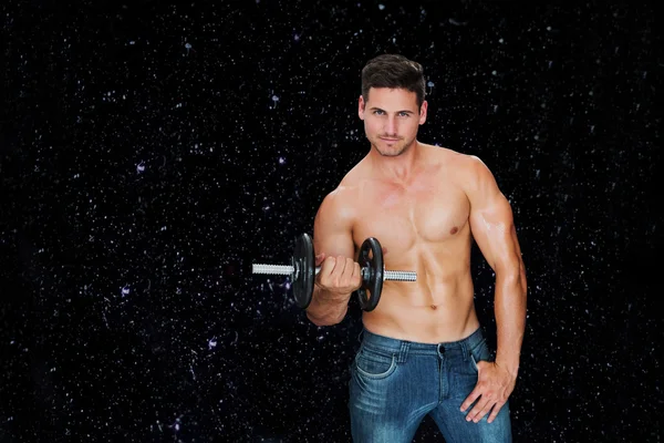 Attractive bodybuilder against black — Stock Photo, Image