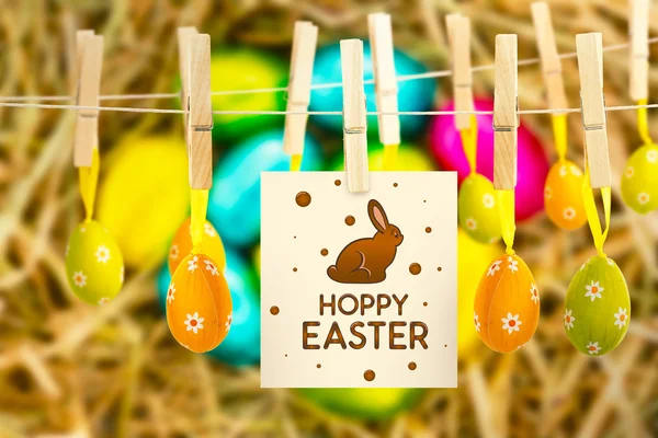 Easter eggs grouped together on straw — Stock Photo, Image