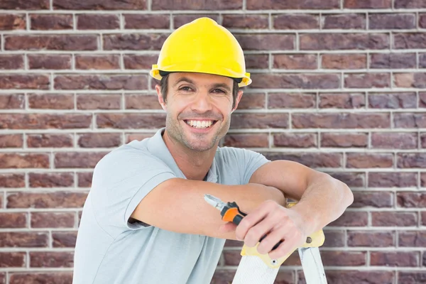 Technician holding pliers — Stock Photo, Image