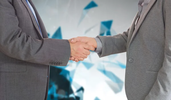 Dois empresários apertando as mãos — Fotografia de Stock