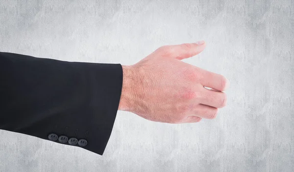 Businessman holding something with his hands — Stock Photo, Image