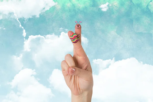 Fingers as easter bunny against blue sky — Stock Photo, Image