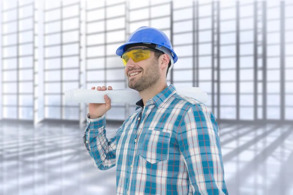 Composite image of smiling architect looking away while holding — Stock Photo, Image
