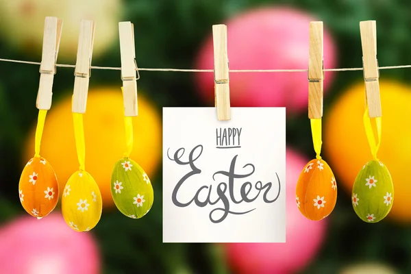 Happy easter afbeelding tegen paaseieren — Stockfoto