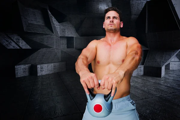 Samengestelde afbeelding van bodybuilder houden kettlebell — Stockfoto