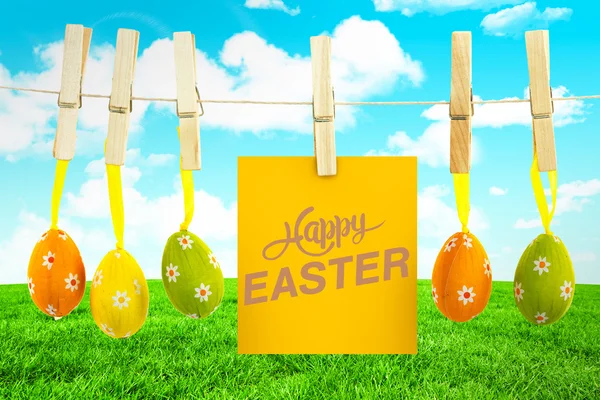 Happy easter afbeelding tegen veld — Stockfoto