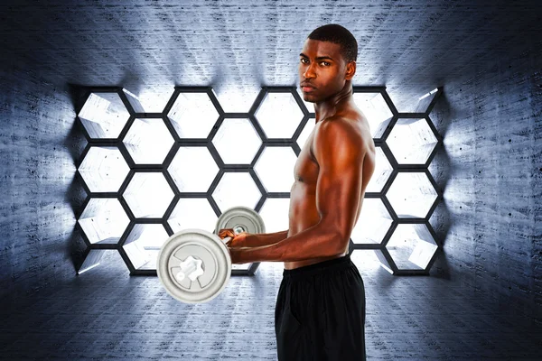 Young man lifting barbell — Stock Photo, Image