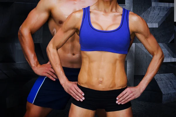 Kompositbild des Bodybuilding-Paares — Stockfoto