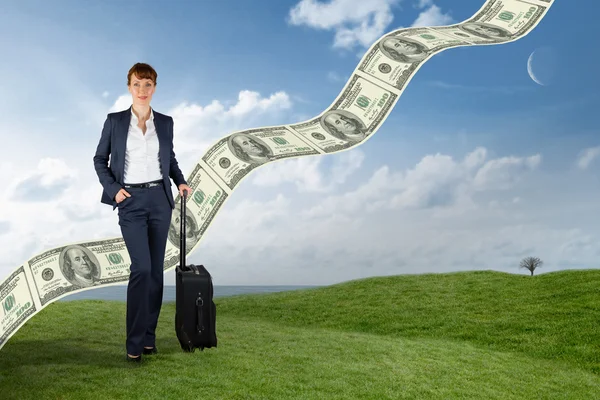 Composite image of businesswoman with suitcase — Stock Photo, Image