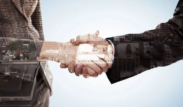 Two businesspeople shaking their hands — Stock Photo, Image