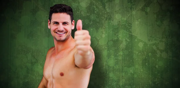 Bodybuilder showing thumbs up — Stock Photo, Image