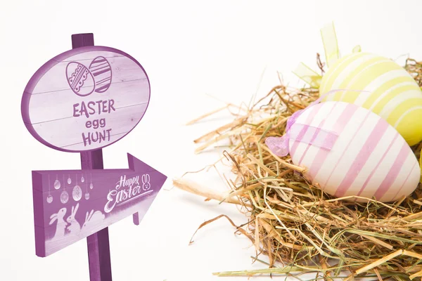 Composite image of easter egg hunt sign — Stock Photo, Image