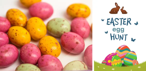 Easter egg hunt graphic against easter eggs — Stock Photo, Image