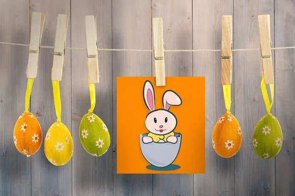 Easter bunny against wooden planks — Stock Photo, Image