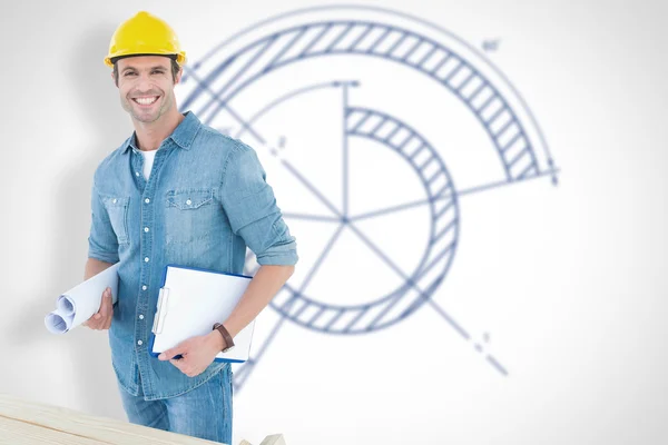 Composite image of happy carpenter holding rolled blueprint and — Stock Photo, Image