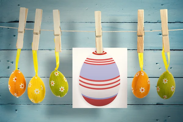 Easter eggs against wooden planks — Stock Photo, Image