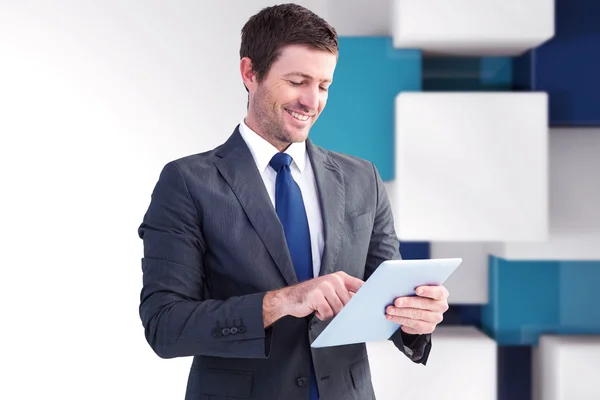 Businessman using his tablet pc — Stock Photo, Image