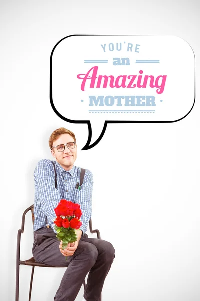 Σύνθετη εικόνα του geeky hipster κρατώντας ένα μάτσο τριαντάφυλλα — Φωτογραφία Αρχείου