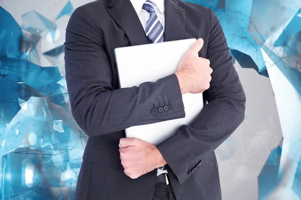 Businessman holding his laptop — Stock Photo, Image