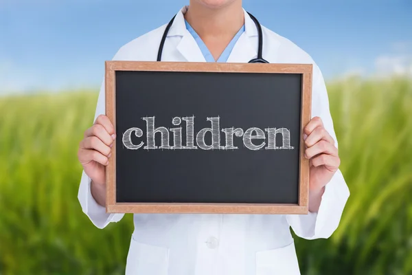 Children against green meadow — Stock Photo, Image