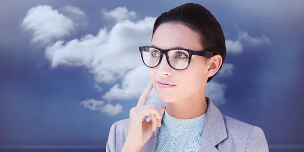 Composite image of happy brunette — Stock Photo, Image