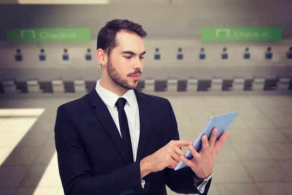 Businessman touching digital tablet a — Stock Photo, Image