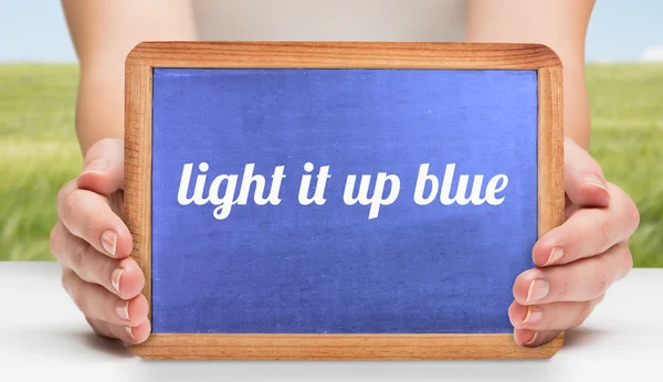 Light it up blue against meadow — Stock Photo, Image