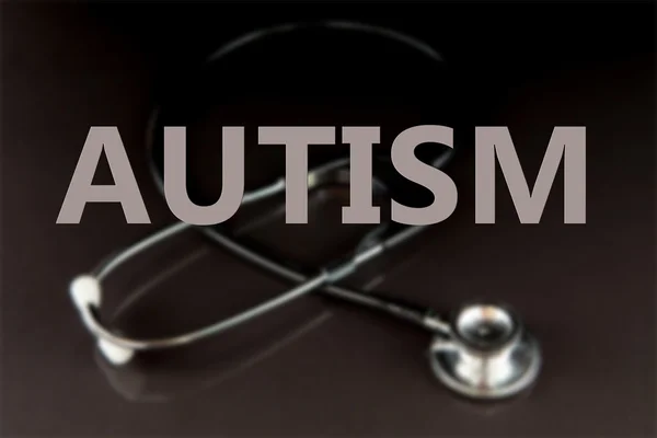 Autism against metal black stethoscope — Stock Photo, Image
