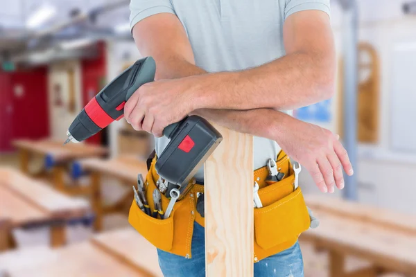 Male carpenter with power drill — Stock Photo, Image