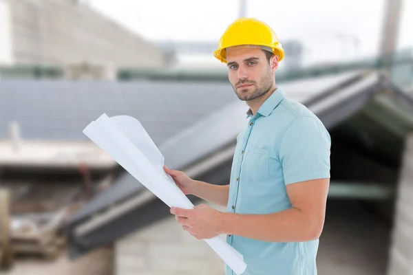 Confident male architect holding blueprint — Stock Photo, Image