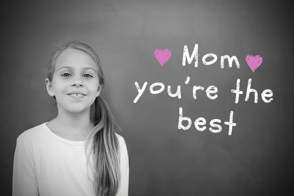 Composite image of schoolchild with blackboard — Stock Photo, Image