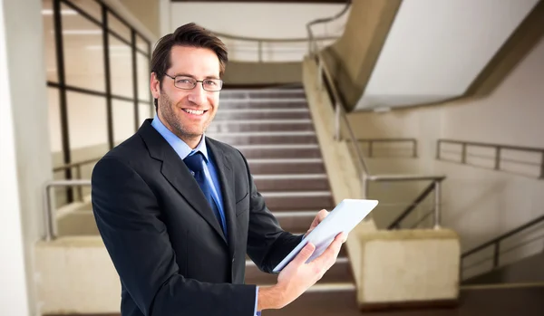 Businessman using his tablet — Stock Photo, Image