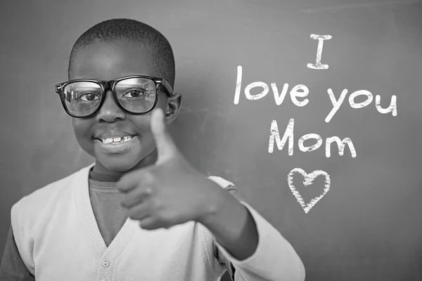 Composite image of schoolchild with blackboard — Stock Photo, Image