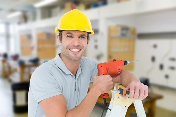 Technician holding drill machine — Stock Photo, Image