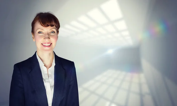 Imagen compuesta de la mujer de negocios feliz — Foto de Stock