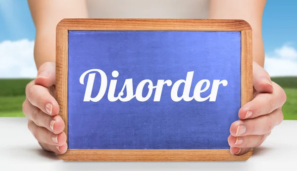 Disorder and hands showing chalkboard — Stock Photo, Image