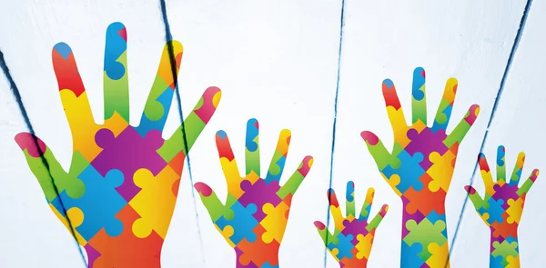 Sammansatt bild av autism awareness hand — Stockfoto