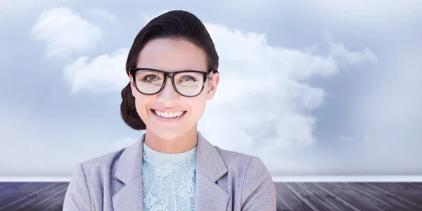 Composite image of happy brunette — Stock Photo, Image