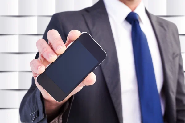 Businessman showing his smartphone screen — Stock Photo, Image