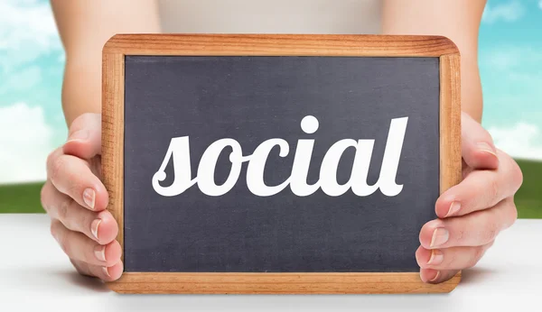 Social and females hands showing blackboard — Stock Photo, Image
