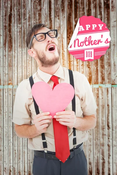 Hipster crying and holding heart card — Stock Photo, Image