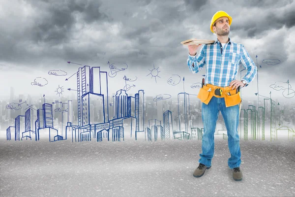 Worker carrying wooden planks — Stock Photo, Image