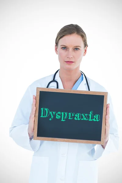 Dyspraxia contro medico che mostra lavagna — Foto Stock