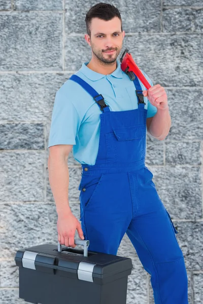 Repairman with toolbox and monkey wrench — Stock Photo, Image