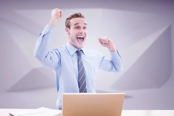 Composite image of businessman cheering — Stock Photo, Image