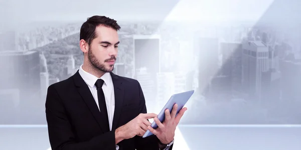 Hombre de negocios alegre tocando la tableta digital —  Fotos de Stock