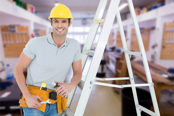 Worker holding tools — Stock Photo, Image