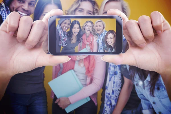 Hand holding smartphone — Stock Photo, Image